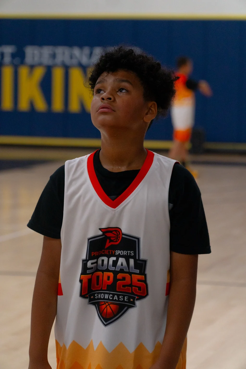A player wearing a Prociety SoCal Top 25 Showcase uniform